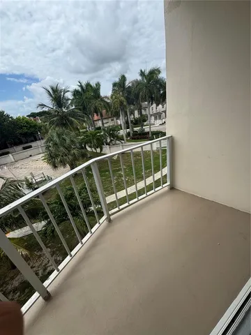 a view of a balcony with an outdoor space