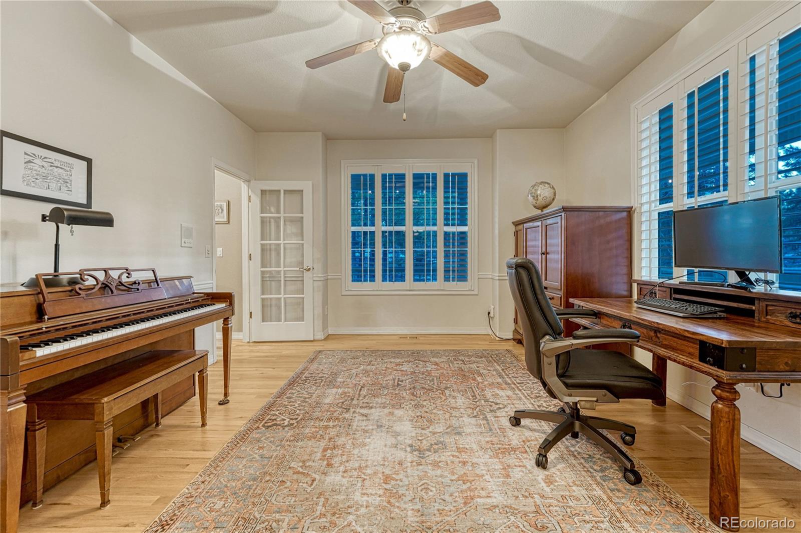 18150 Bakers Farm Road Colorado Springs, CO 80908 - Photo 16 of 49 a view of a workspace with furniture and a window