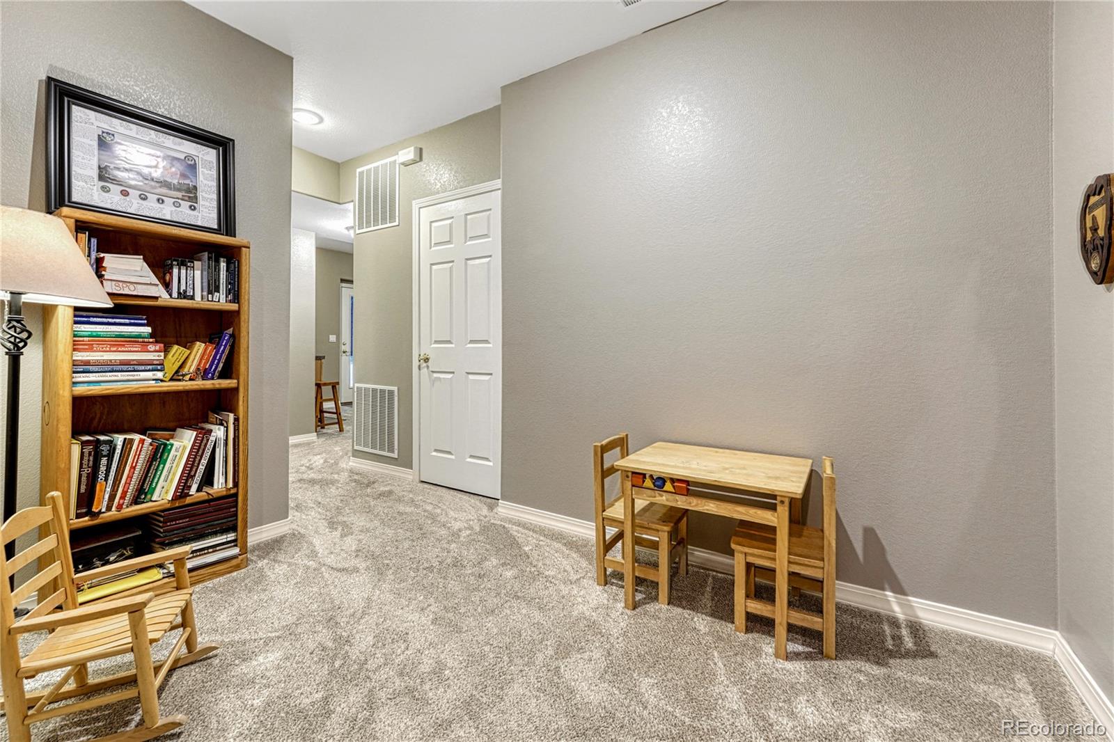 18150 Bakers Farm Road Colorado Springs, CO 80908 - Photo 31 of 49 a view of a livingroom with furniture and closet