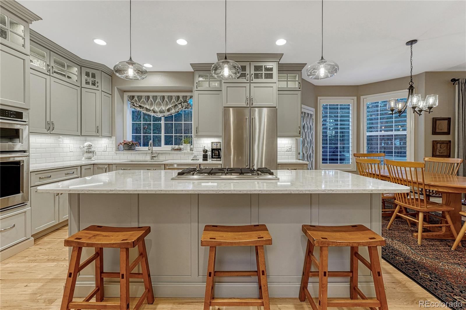 18150 Bakers Farm Road Colorado Springs, CO 80908 - Photo 10 of 49 a kitchen with counter top space and appliances