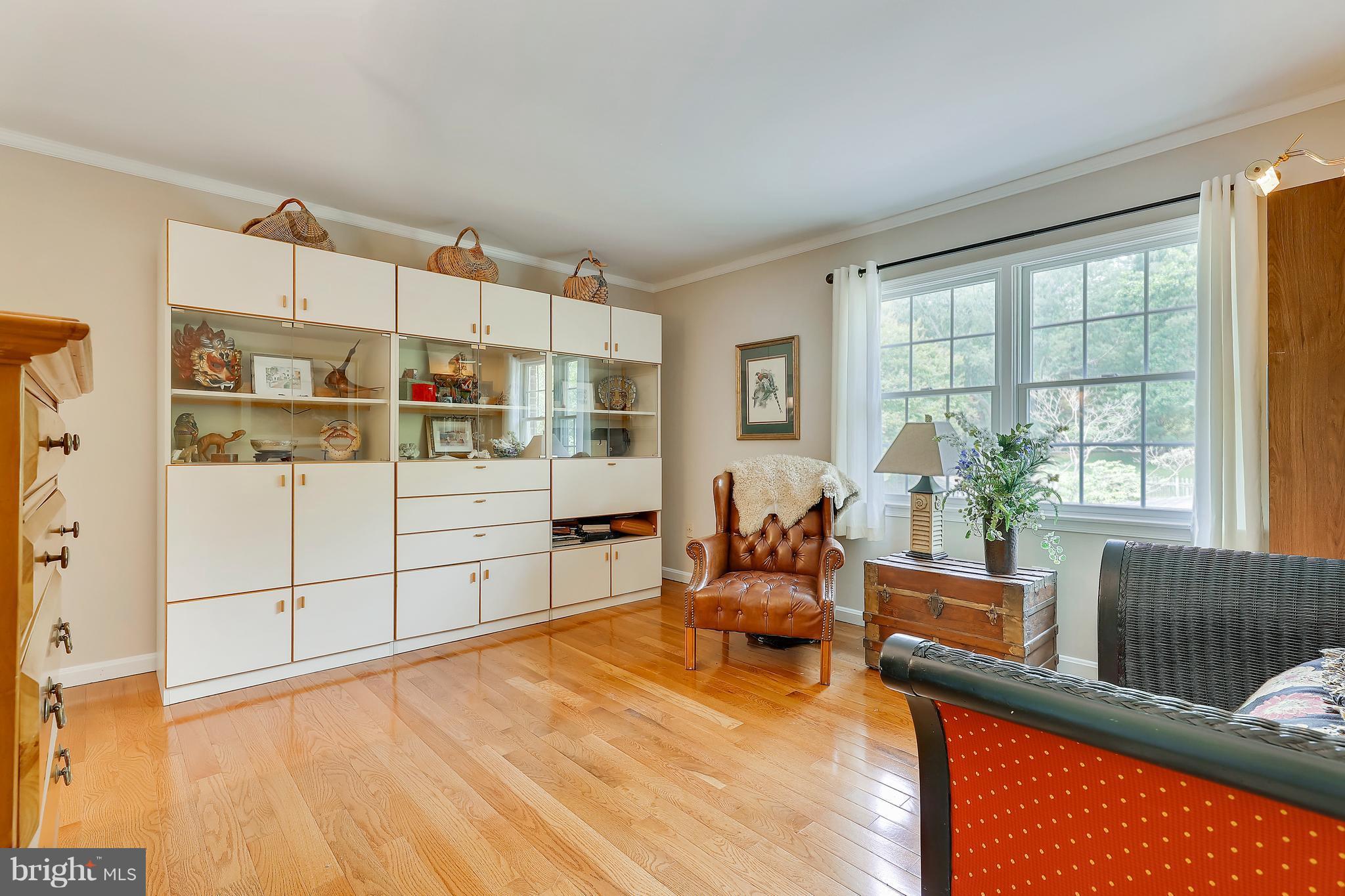 13402 Cambria Farms Road Phoenix, MD 21131 - Photo 26 of 28 a living room with furniture windows and a flat screen tv