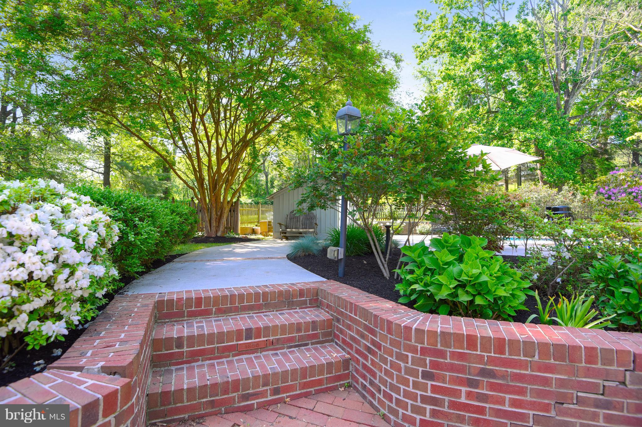 13402 Cambria Farms Road Phoenix, MD 21131 - Photo 5 of 28 a view of a garden with pathway