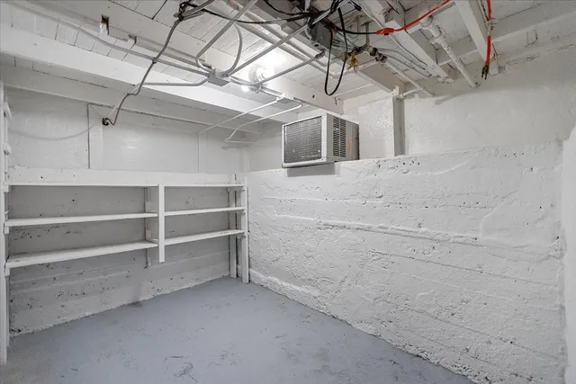 a view of a room with racks on the wall