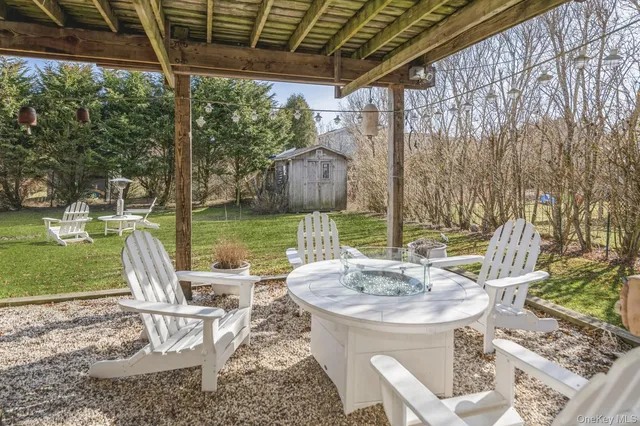 a view of a table and chairs in the patio