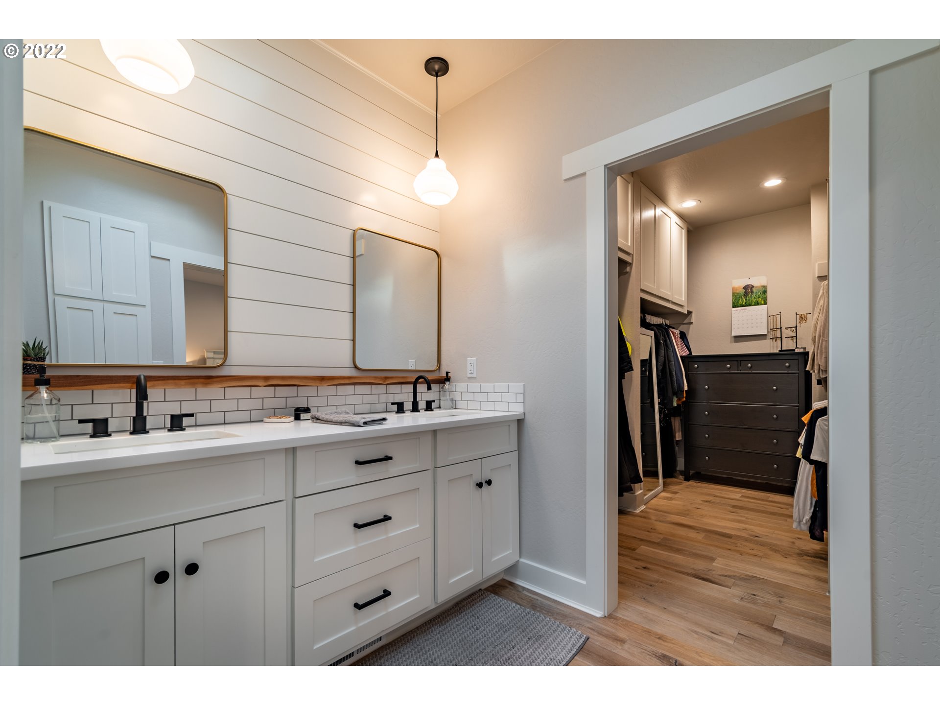37190 Wheeler Road Pleasant Hill, OR 97455 - Photo 13 of 29 a bathroom with a double vanity sink and mirror