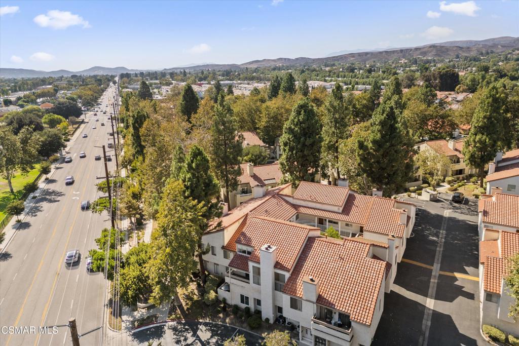 3306 Darby Street, Unit 402 Simi Valley, CA 93063 - Photo 25 of 31 an aerial view of residential house with outdoor space and trees