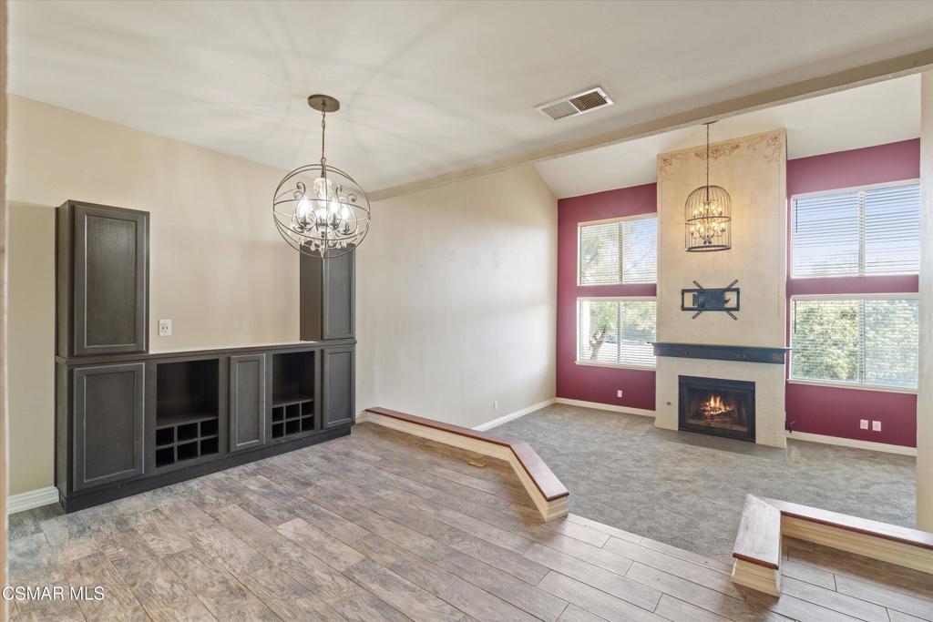3306 Darby Street, Unit 402 Simi Valley, CA 93063 - Photo 3 of 31 a living room with fireplace furniture and a window