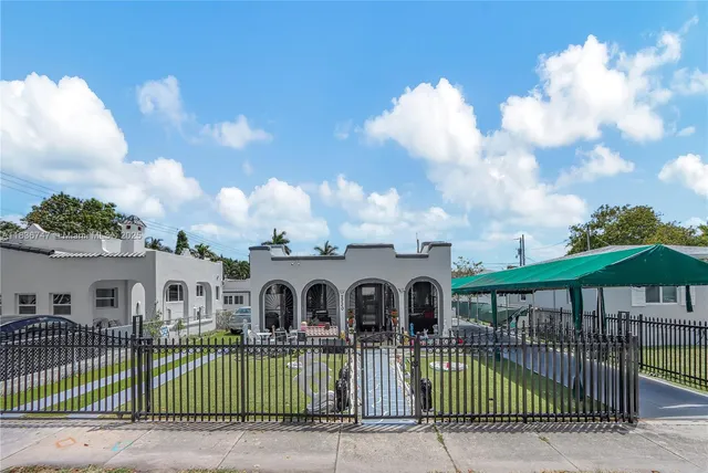 an aerial view of a house with a balcony