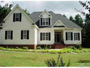 2011 Swift Creek Road Smithfield, NC 27577 - Photo 1 of 1 Built in 2002 on 4.7 acres, the beautiful home has exceptional value. 4 bedrooms & 3 full baths. Large 2-car garage. 9-ft ceilings. Hardwood flooring. Security system. 380 sq ft unfinished space on 2nd story. Covered front entrance. Exterior Front