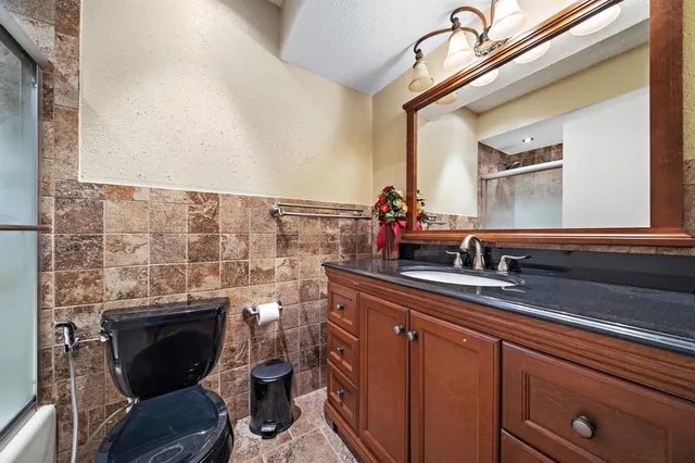 a bathroom with a sink and a toilet