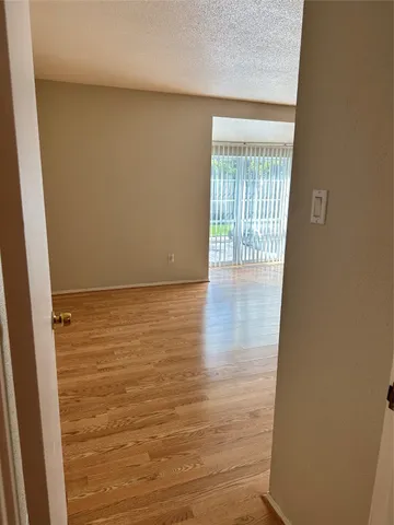 a view of an empty room and window