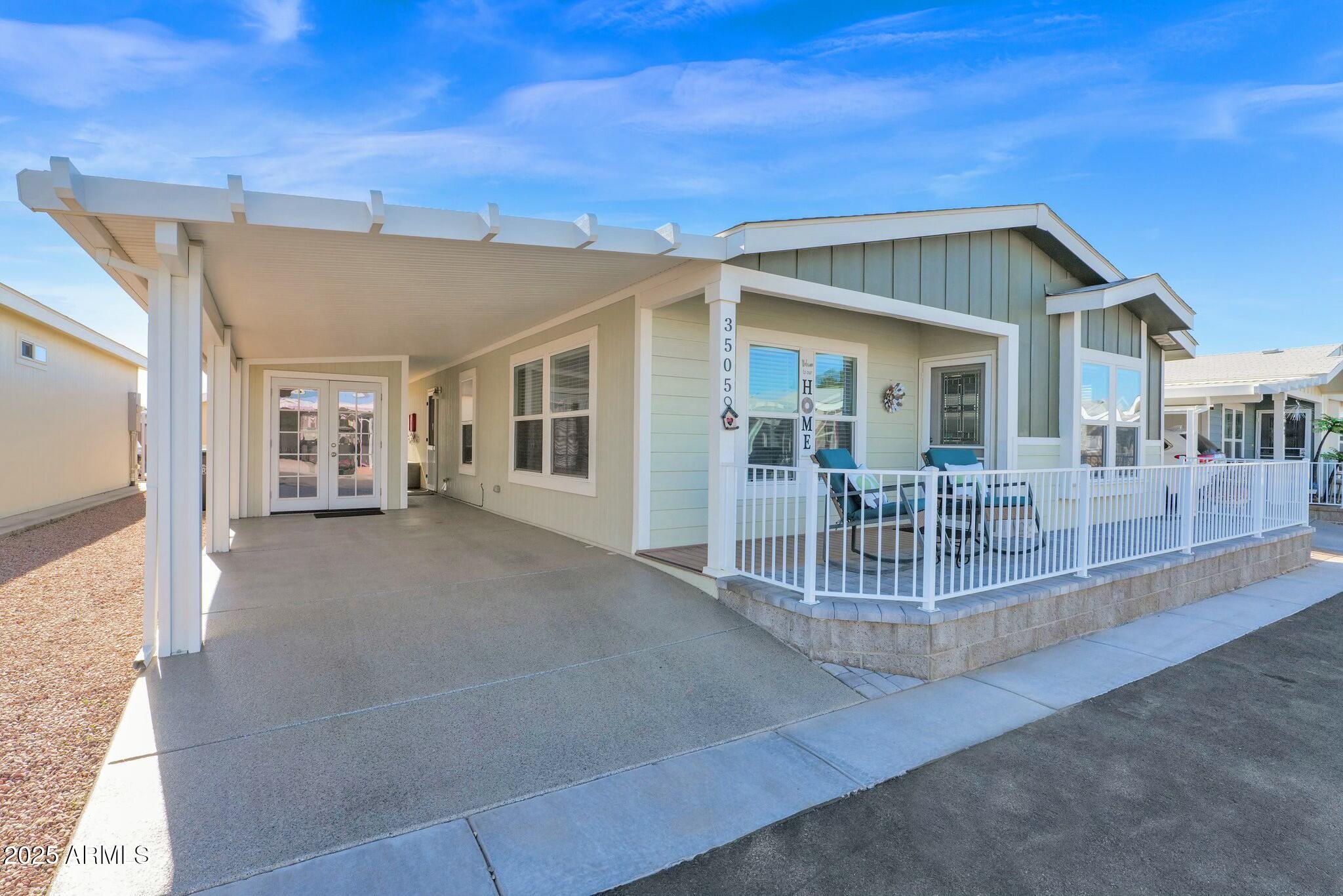 650 North Hawes Road, Unit 3505 Mesa, AZ 85207 - Photo 1 of 46 a view of a house with a flat outdoor space