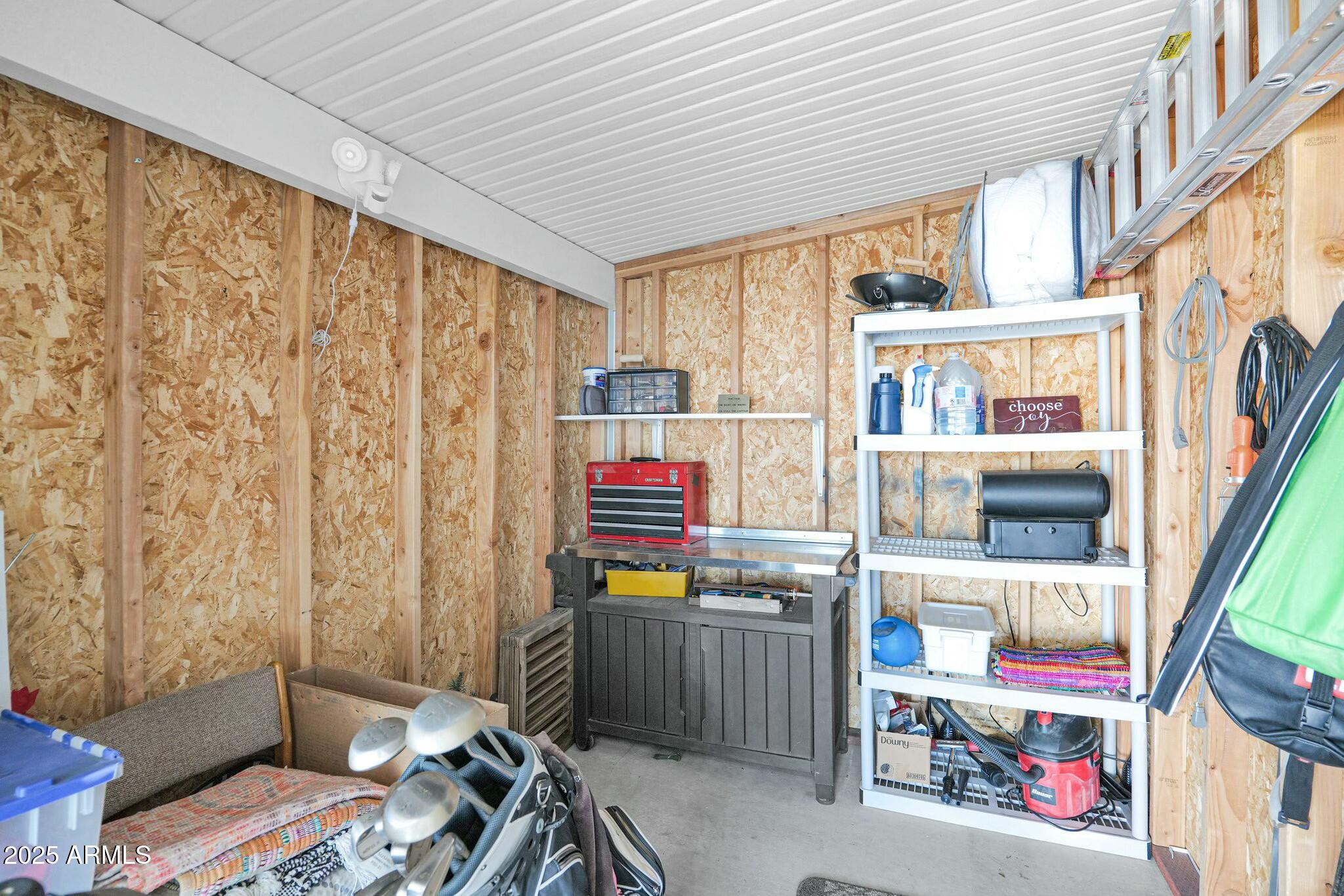 650 North Hawes Road, Unit 3505 Mesa, AZ 85207 - Photo 30 of 46 a room with furniture and a window