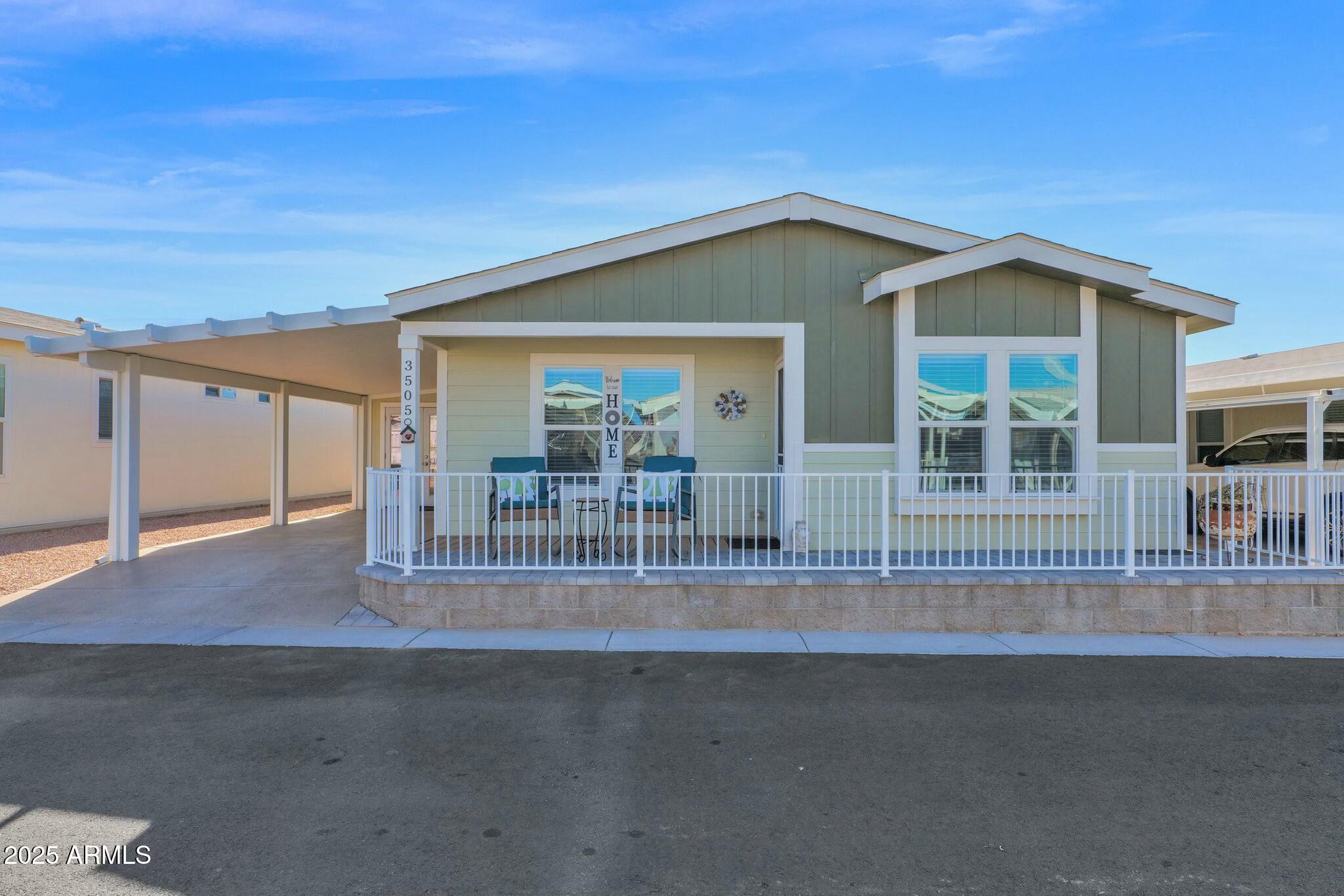 650 North Hawes Road, Unit 3505 Mesa, AZ 85207 - Photo 3 of 46 front view of house with large windows