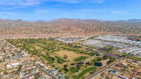 a view of a city with mountains in the background