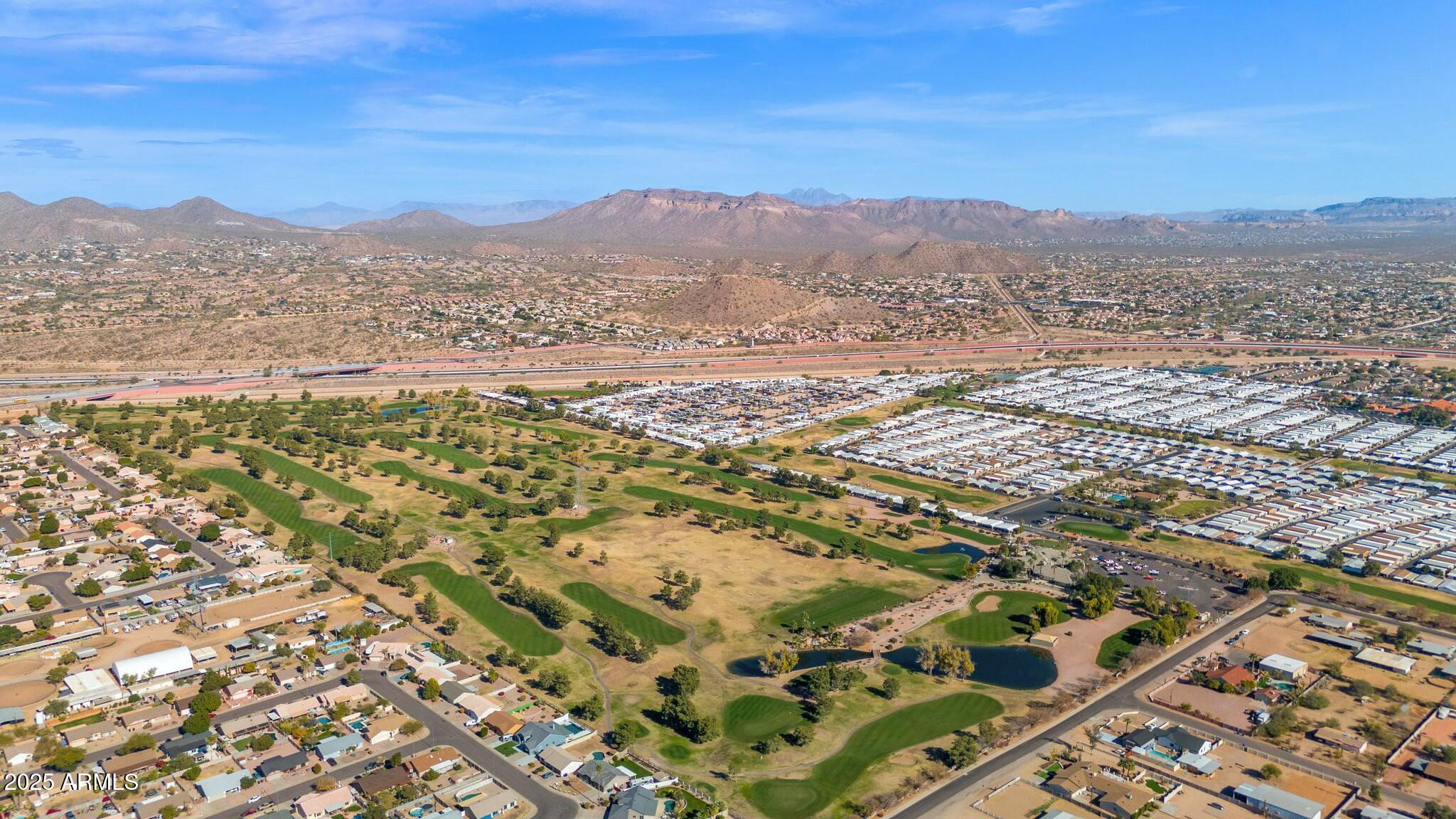 650 North Hawes Road, Unit 3505 Mesa, AZ 85207 - Photo 41 of 46 a view of a city with mountains in the background