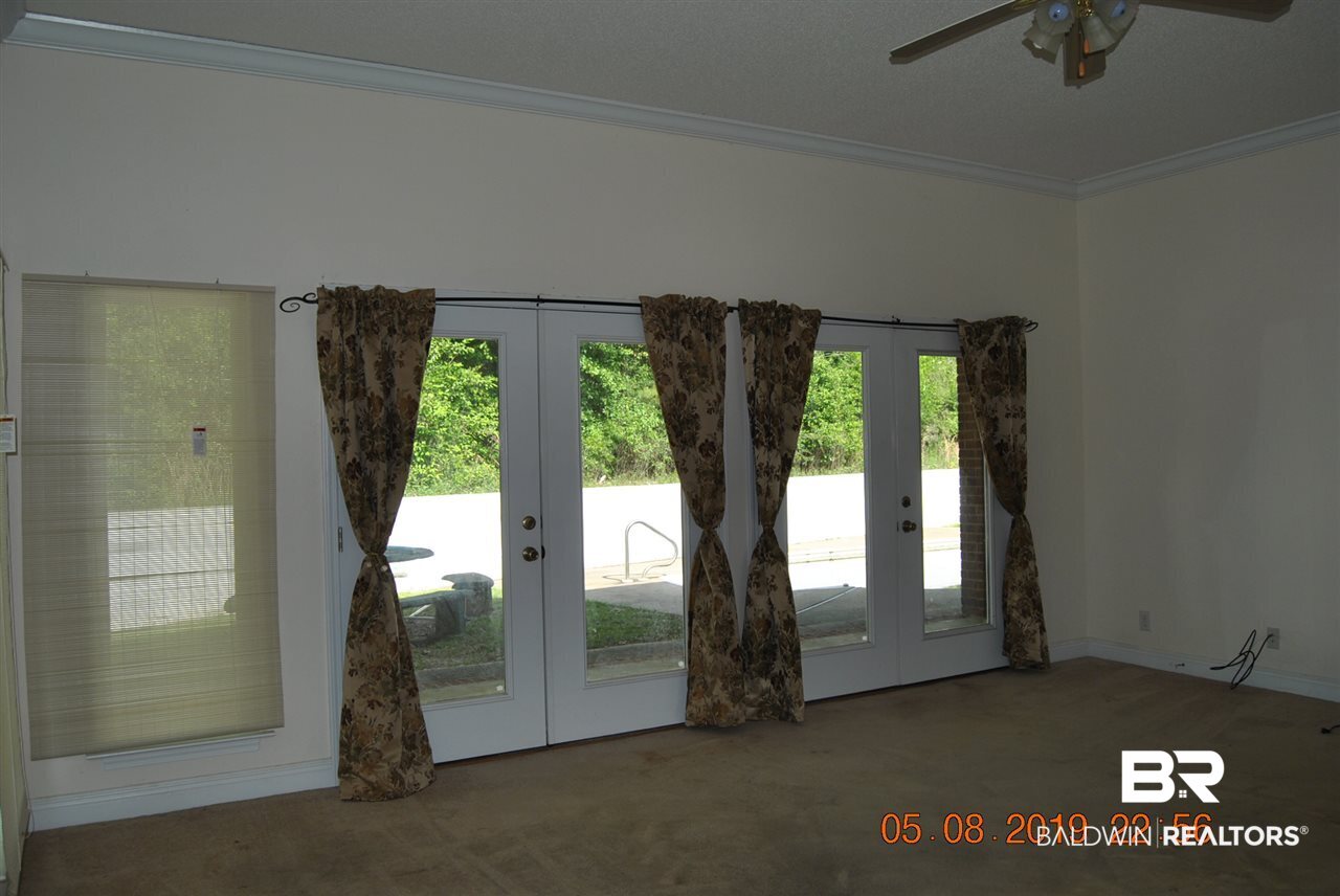 411 Juniper Creek Road Brewton, AL 36426 - Photo 24 of 35 large with a wall of windows you can fit big furni
