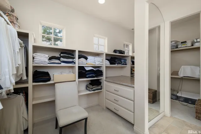 a kitchen with a refrigerator and a stove