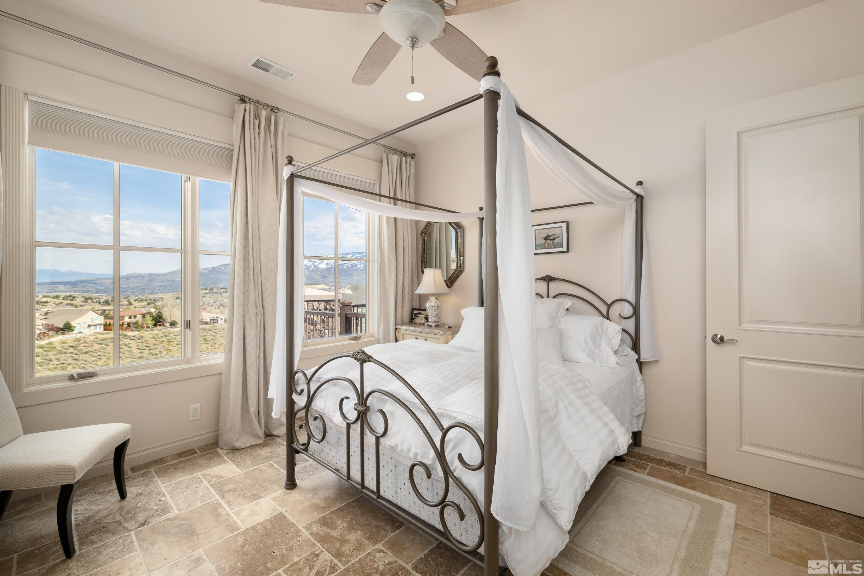 2440 Mountain Spirit Trail Reno, NV 89523 - Photo 20 of 34 a bathroom with a bathtub and windows
