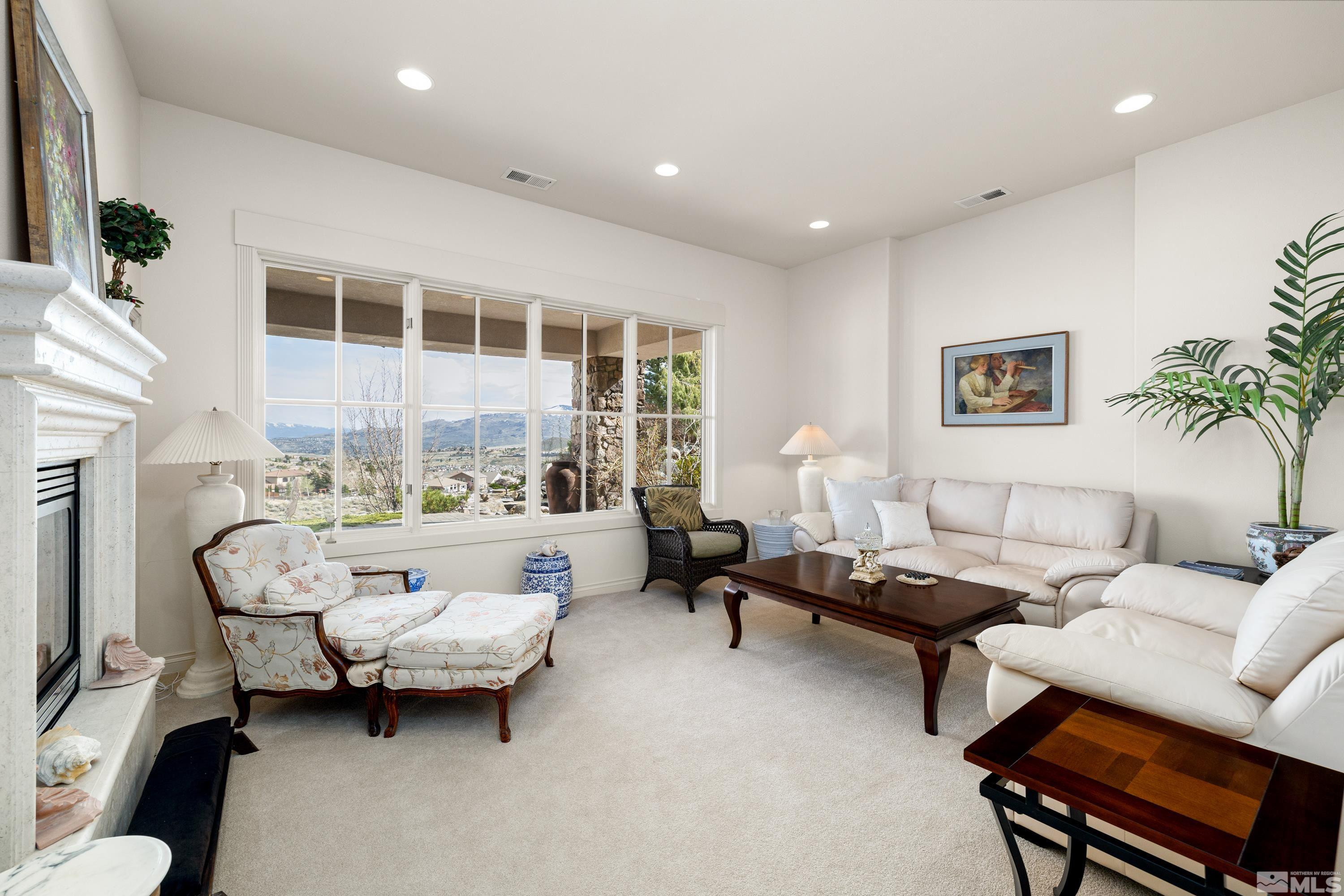 2440 Mountain Spirit Trail Reno, NV 89523 - Photo 26 of 34 a living room with furniture and a large window