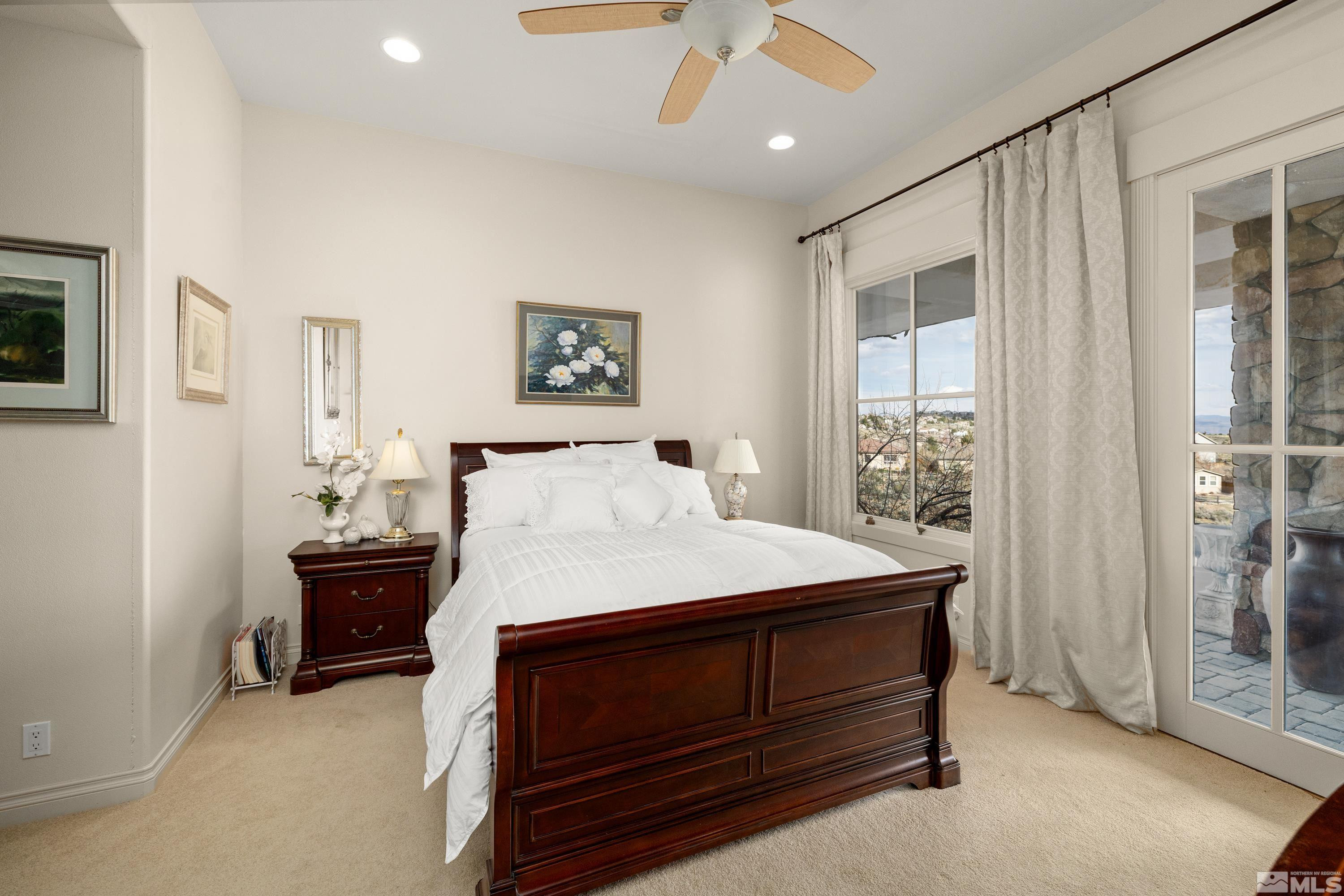 2440 Mountain Spirit Trail Reno, NV 89523 - Photo 28 of 34 a bedroom with a bed and a window