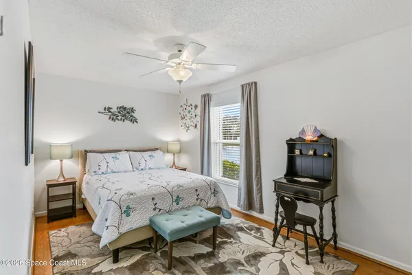workspace with wooden floor and a window