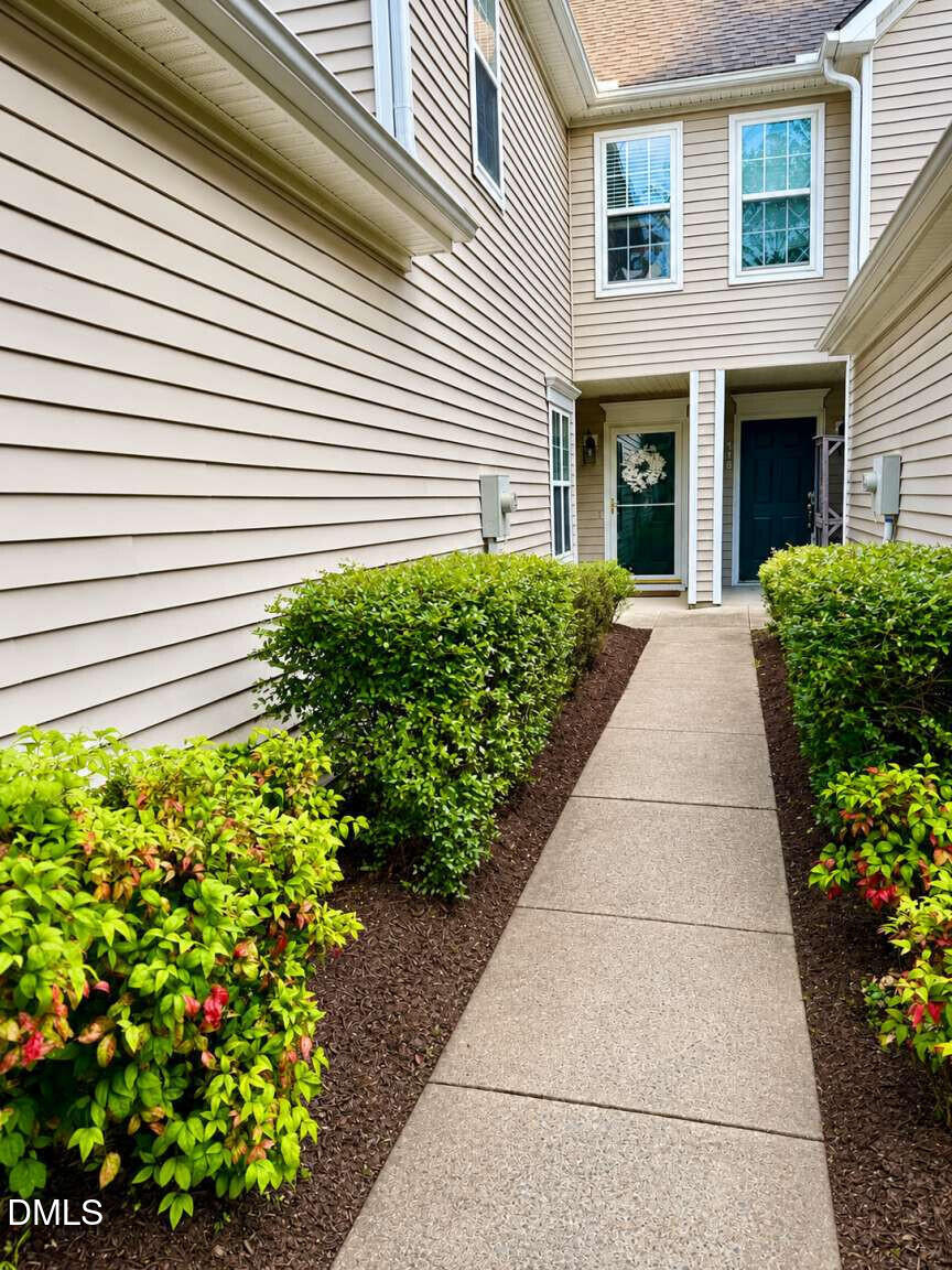 120 Student Place Durham, NC 27713 - Photo 1 of 15 a front view of a house with garden