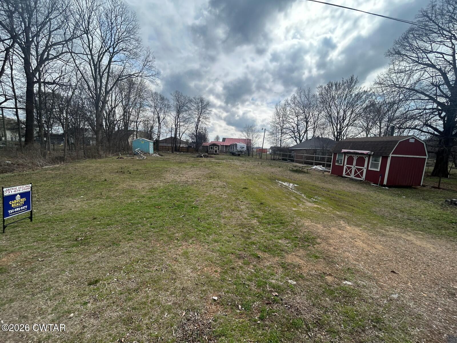 935 Magnolia Road Tiptonville, TN 38079 - Photo 1 of 4 a view of a outdoor space with deck and a garden