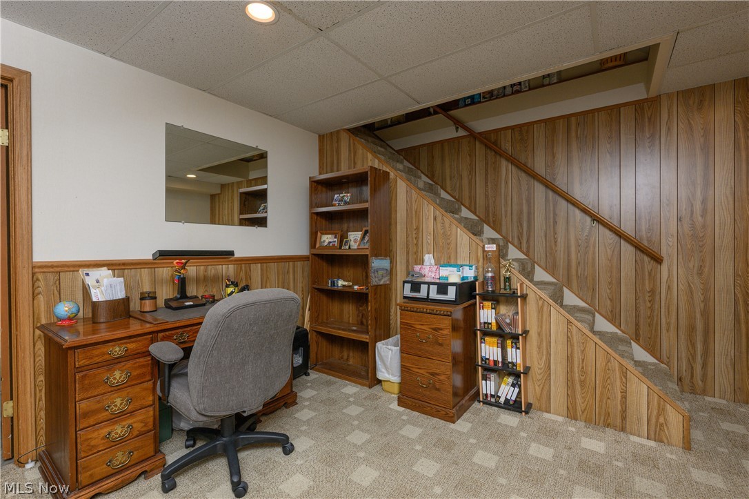 3281 Brenner Road Barberton, OH 44203 - Photo 30 of 33 Carpeted office space with a paneled ceiling and wooden walls