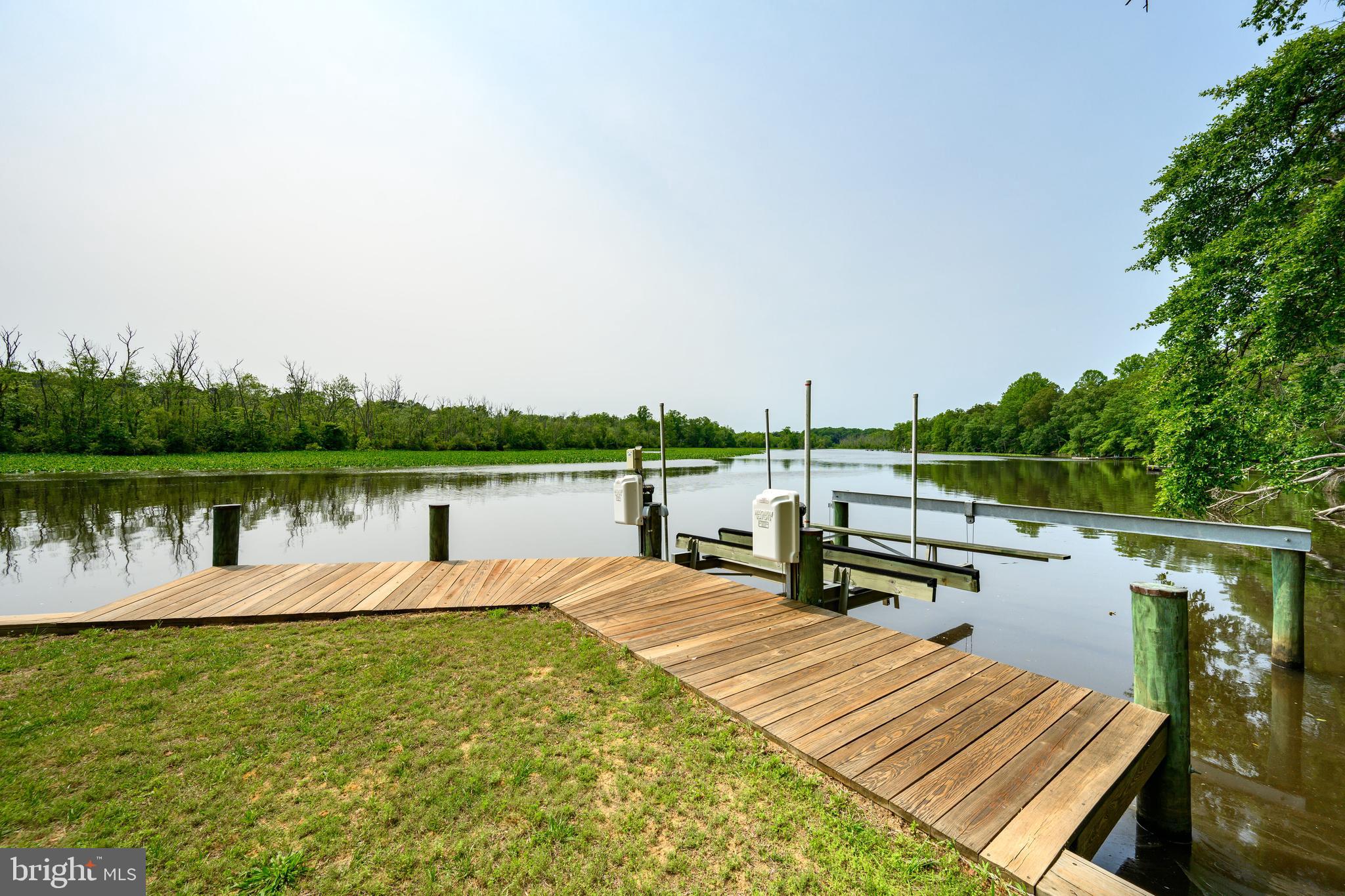 25292 Sandy Point Road Greensboro, MD 21639 - Photo 13 of 65 Pier with lift