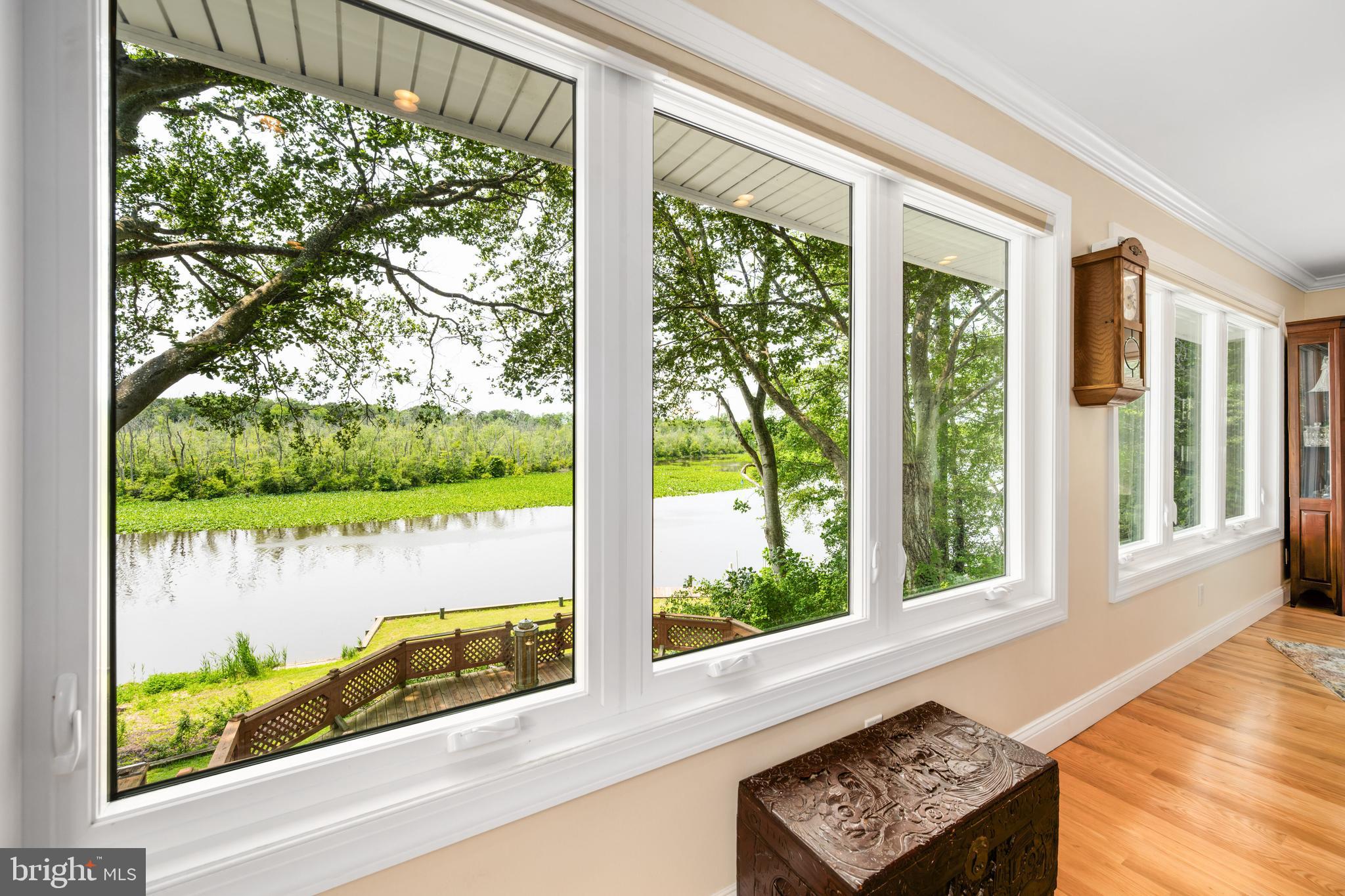 25292 Sandy Point Road Greensboro, MD 21639 - Photo 26 of 65 Wall of windows overlooking the Choptank