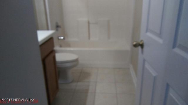 3421 South Saxxon Road St. Augustine, FL 32092 - Photo 6 of 13 a bathroom with a shower