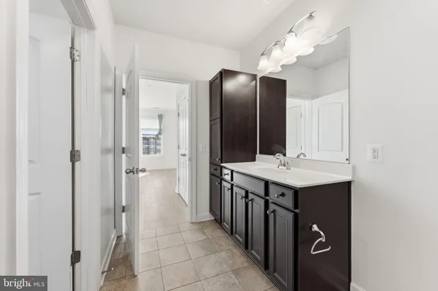 a view of storage and utility room with washer and dryer