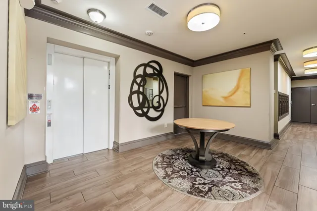 a view of a building with a swimming pool