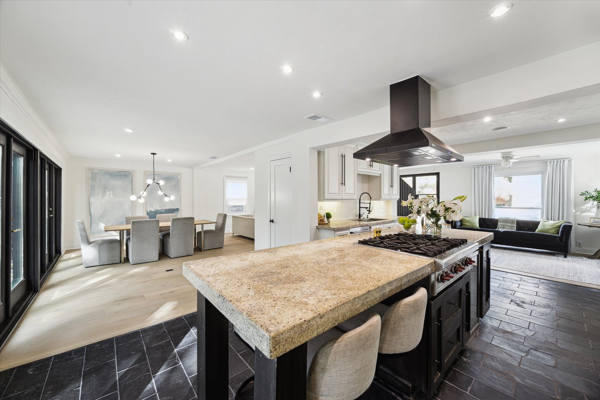 4148 Bissonnet Street West University Place, TX 77005 - Photo 13 of 39 a kitchen with stainless steel appliances granite countertop a sink a stove and a refrigerator