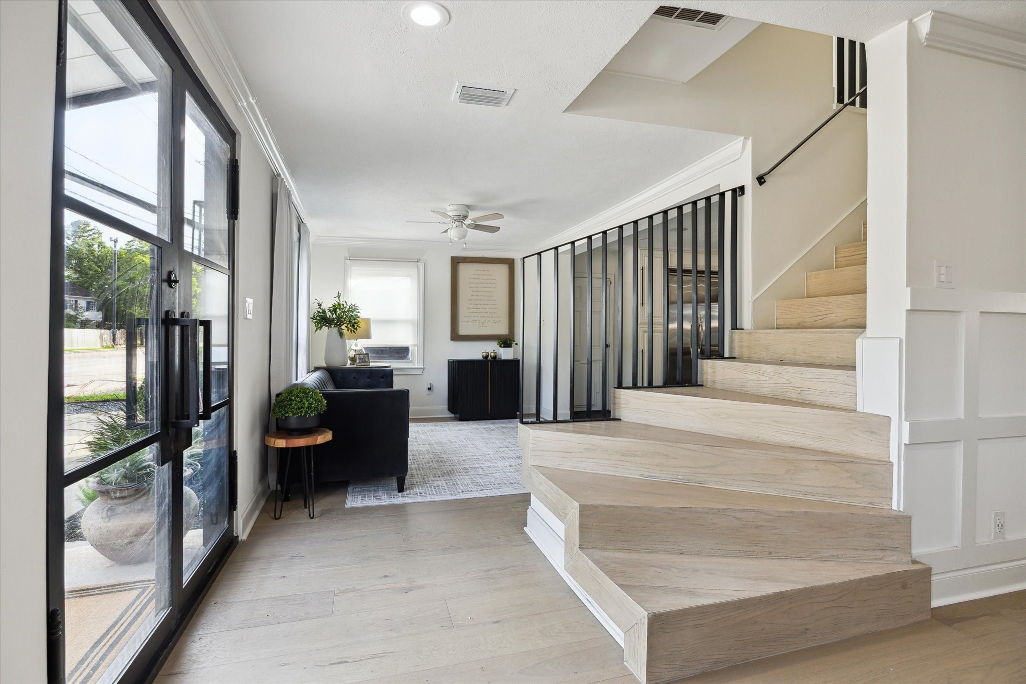 4148 Bissonnet Street West University Place, TX 77005 - Photo 3 of 39 a view of entryway and hall with wooden floor
