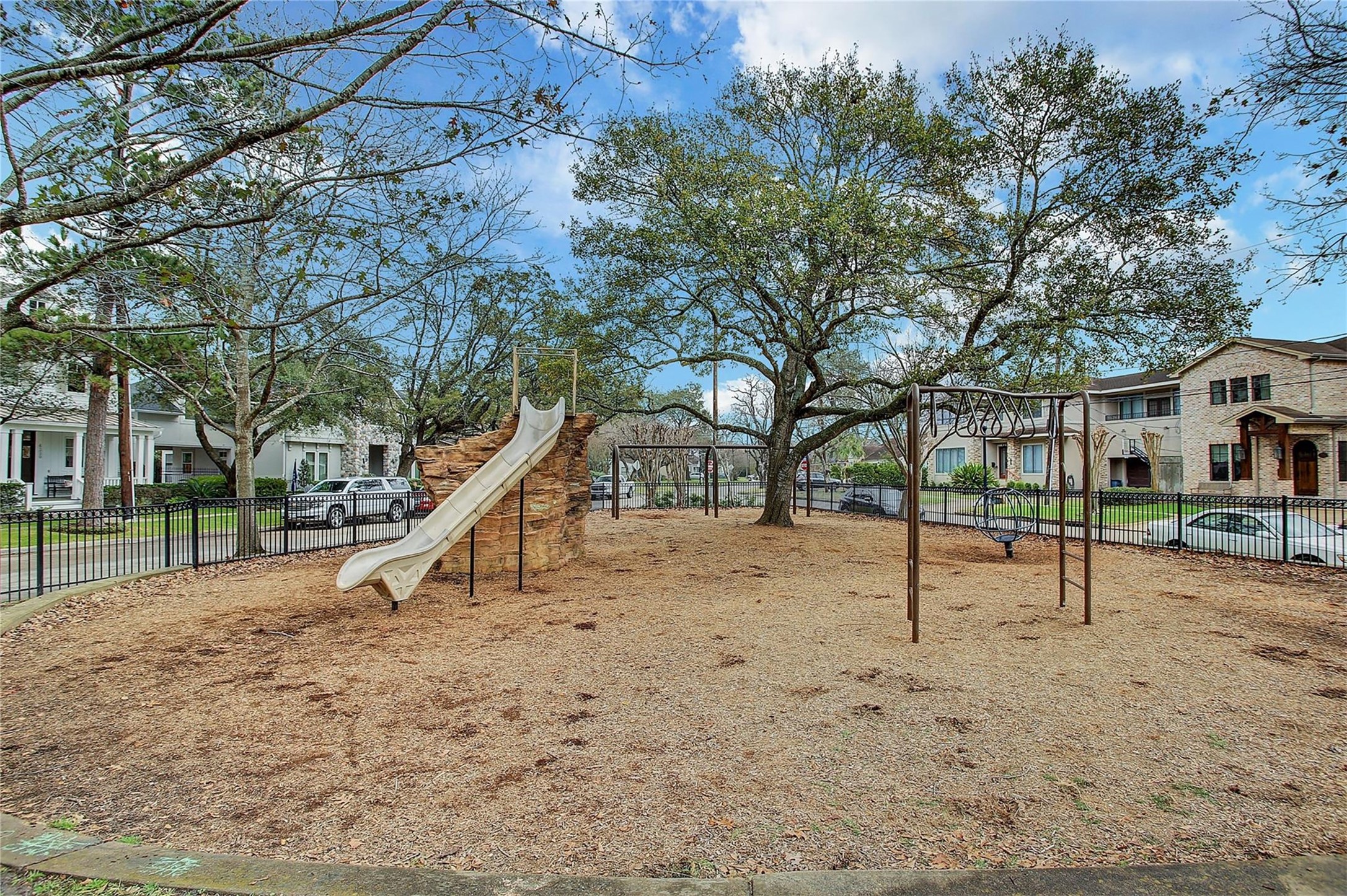 4148 Bissonnet Street West University Place, TX 77005 - Photo 37 of 39 a view of a yard with a slide