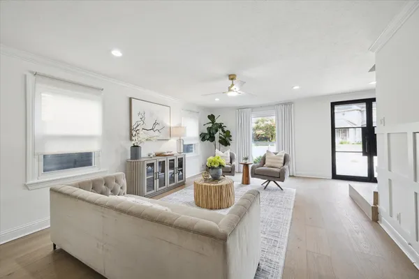 a living room with furniture and window