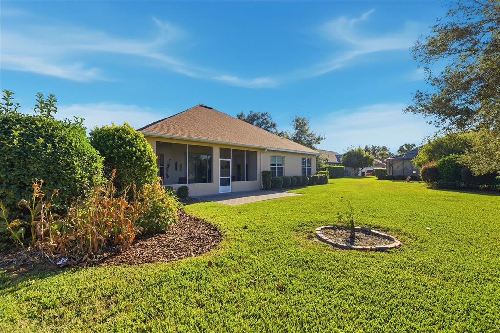 8821 Southwest 82nd Court Road Ocala, FL 34481 - Photo 30 of 32 a view of house with garden space and street view