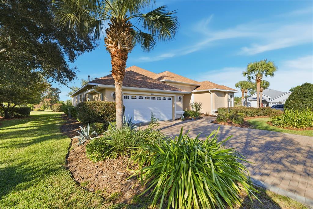 8821 Southwest 82nd Court Road Ocala, FL 34481 - Photo 3 of 32 a view of a house with a yard
