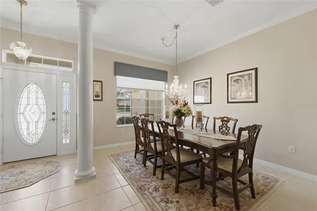 a view of a dining room with furniture
