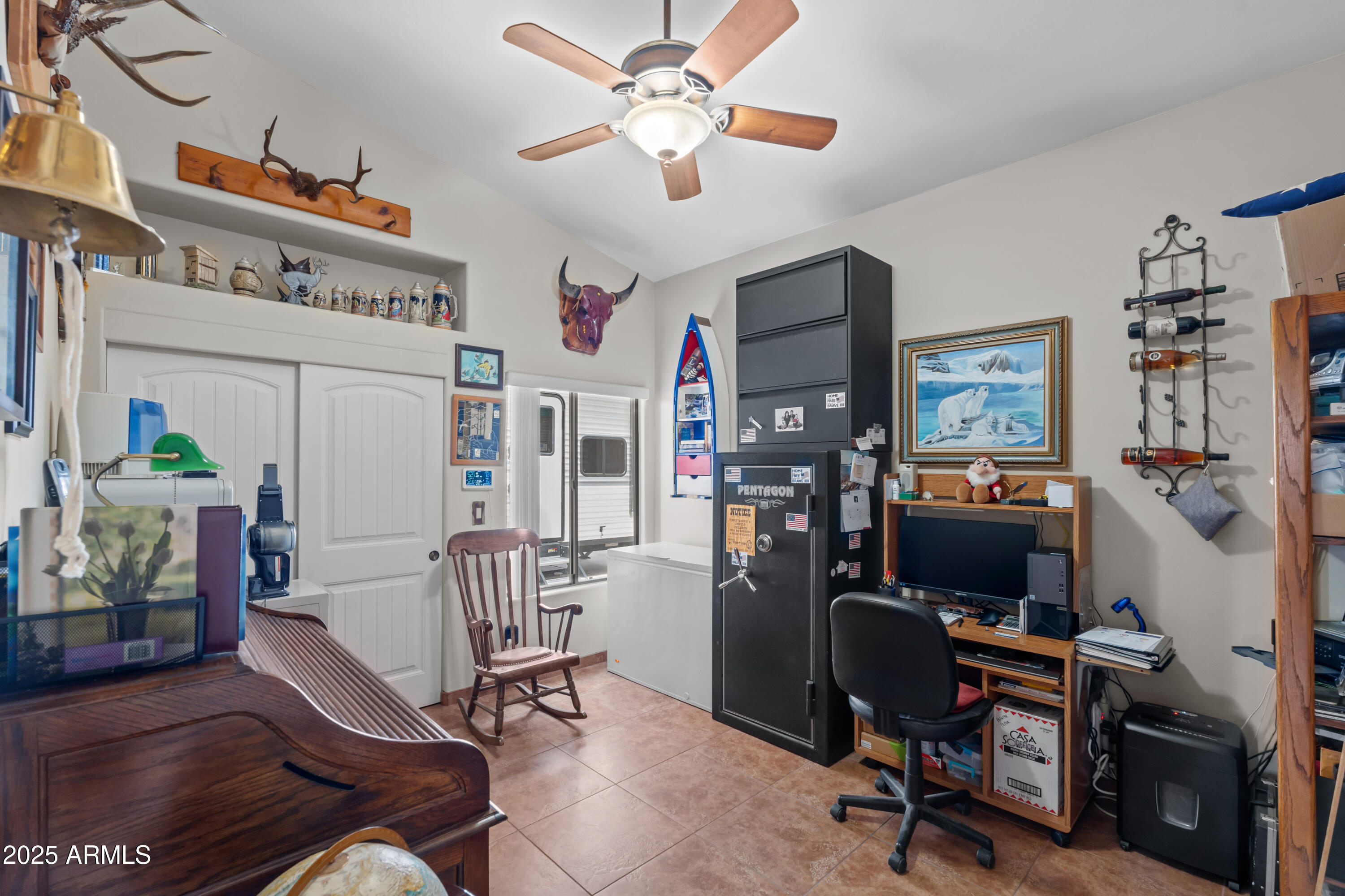 608 Paseo Reforma Rio Rico, AZ 85648 - Photo 29 of 50 a view of a workspace with furniture and a livingroom
