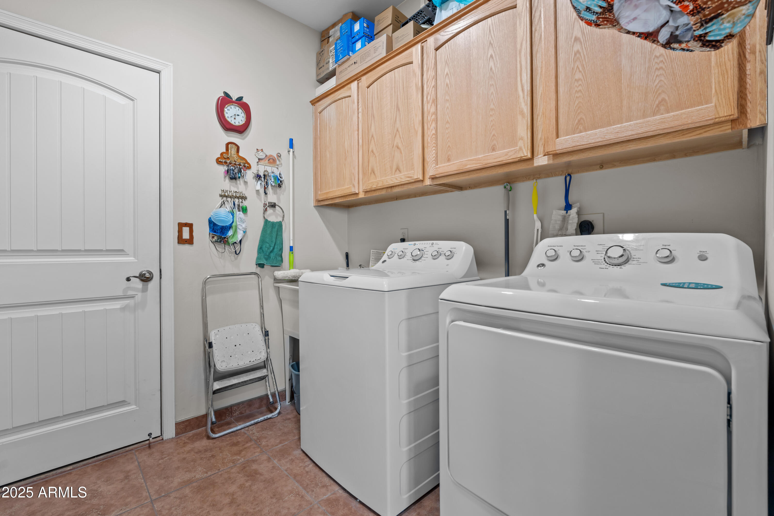 608 Paseo Reforma Rio Rico, AZ 85648 - Photo 31 of 50 a utility room with dryer and washer
