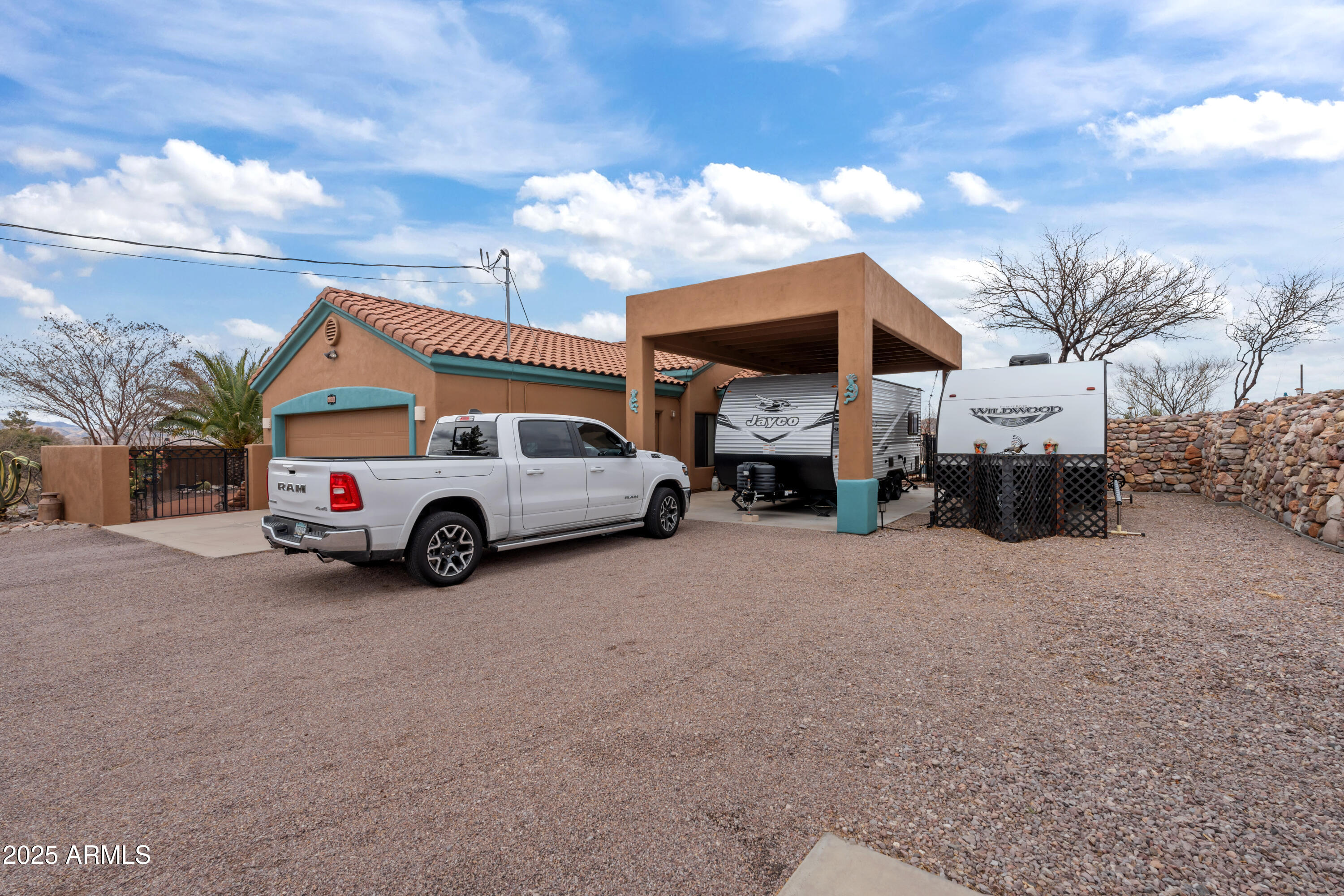 608 Paseo Reforma Rio Rico, AZ 85648 - Photo 41 of 50 a view of a car park in front of house