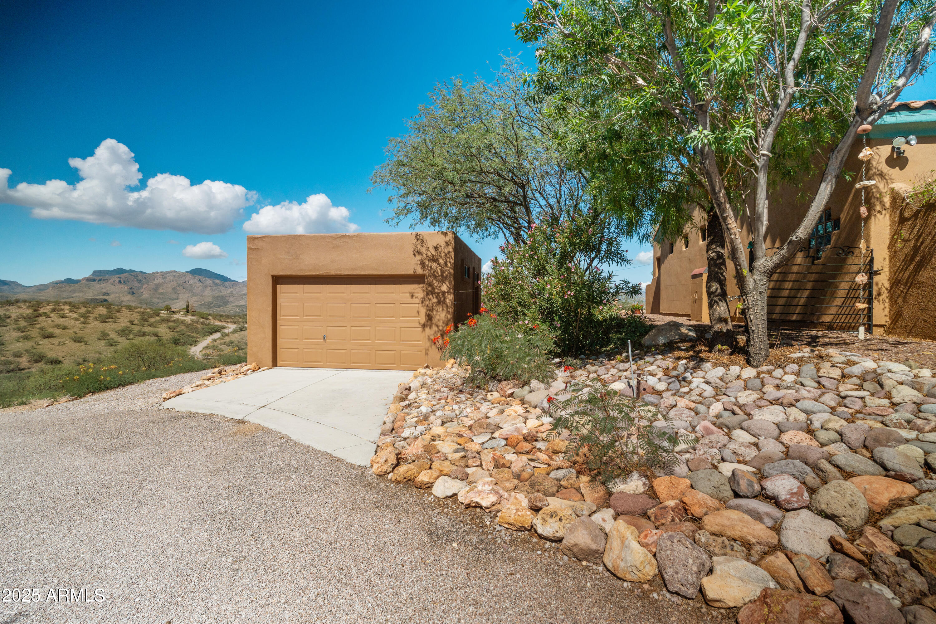 608 Paseo Reforma Rio Rico, AZ 85648 - Photo 43 of 50 a front view of a house with a yard
