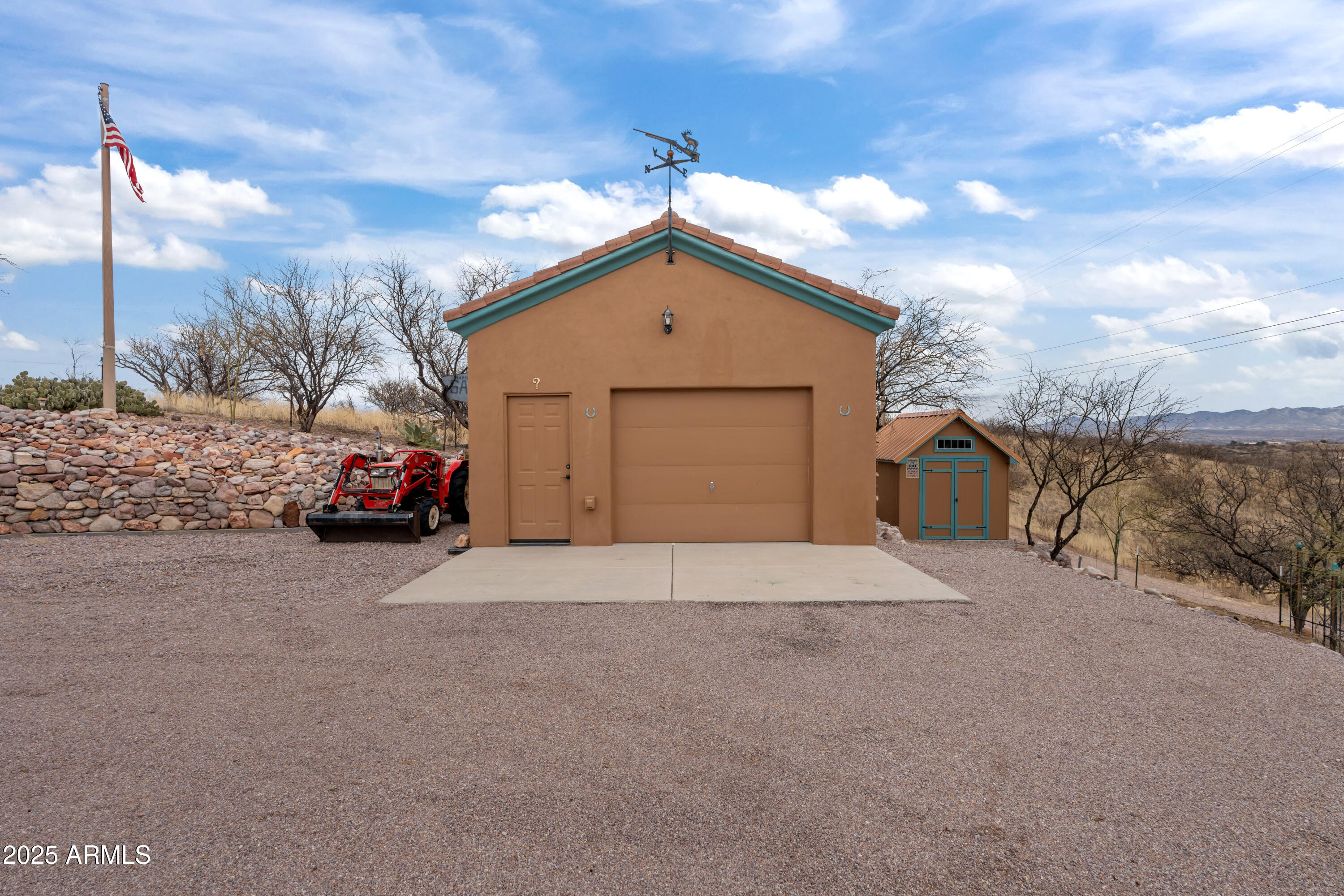608 Paseo Reforma Rio Rico, AZ 85648 - Photo 45 of 50 a view of garage and car parked