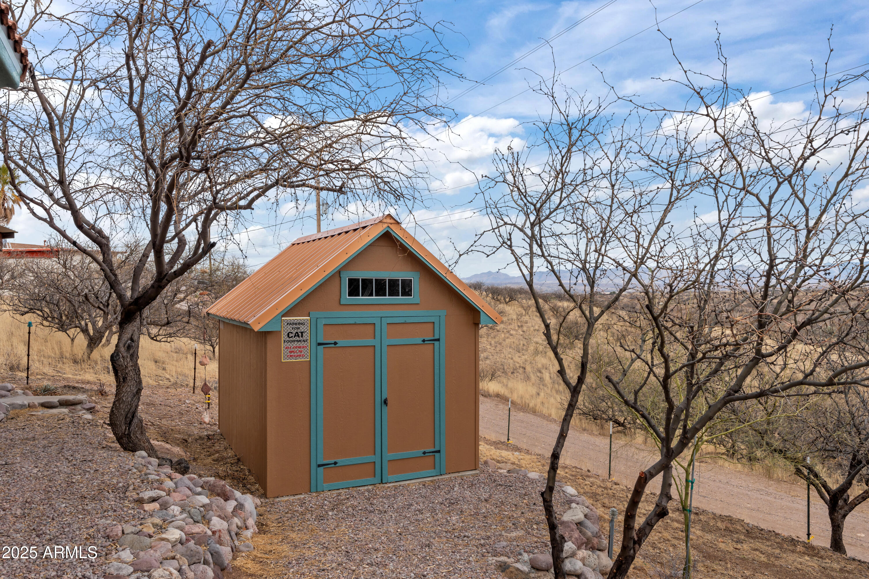 608 Paseo Reforma Rio Rico, AZ 85648 - Photo 46 of 50 a front view of a house with a yard