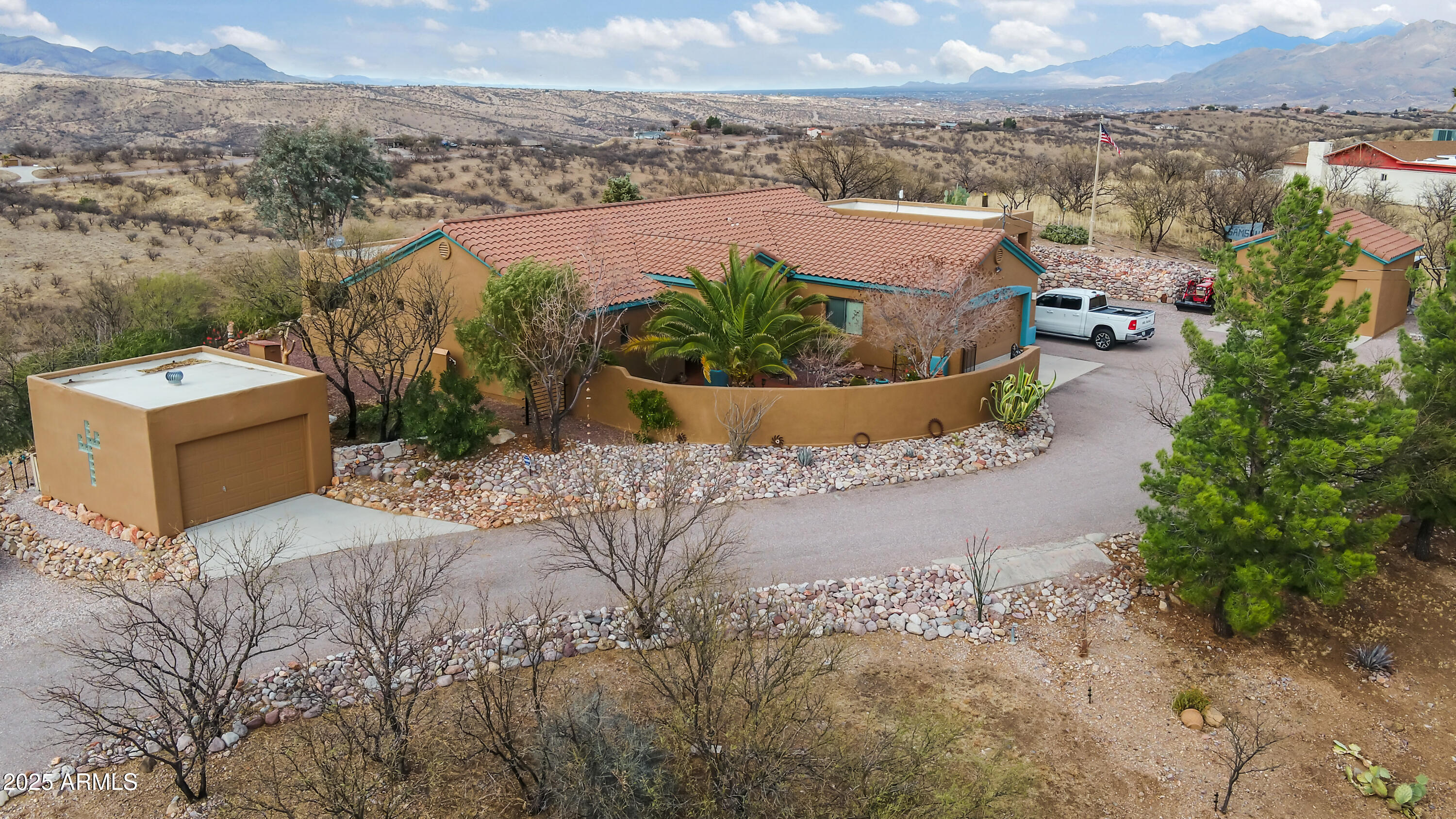 608 Paseo Reforma Rio Rico, AZ 85648 - Photo 5 of 50 an aerial view of a house with a yard and lake view