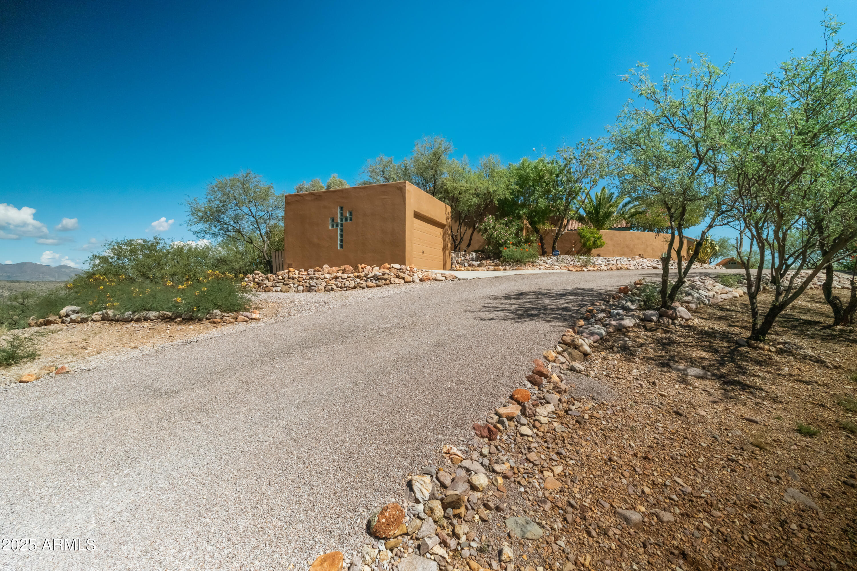 608 Paseo Reforma Rio Rico, AZ 85648 - Photo 6 of 50 a street view with large trees