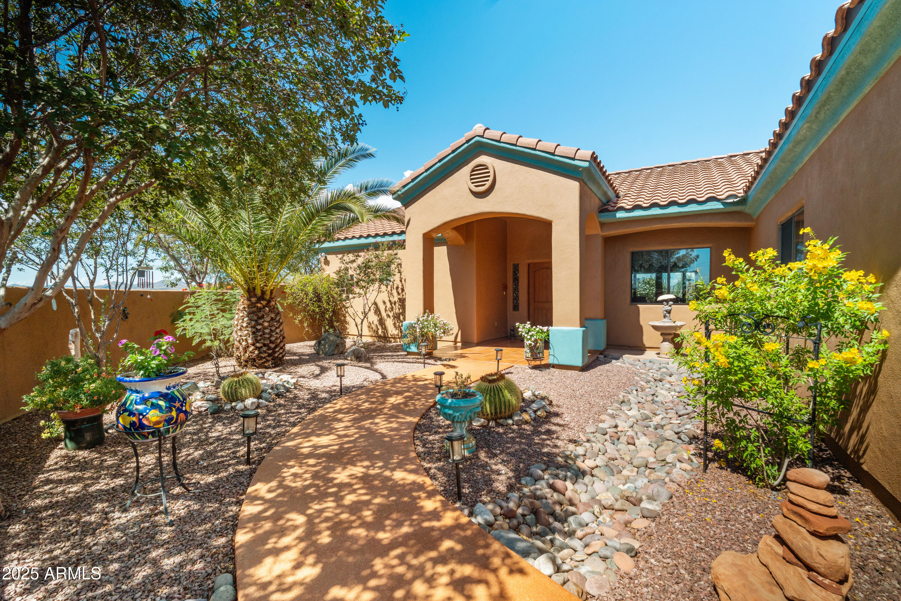 608 Paseo Reforma Rio Rico, AZ 85648 - Photo 9 of 50 a view of a house with a yard